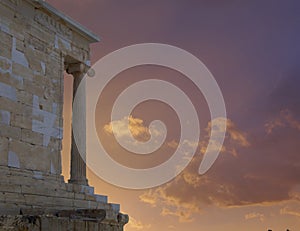Fiery sunset on Acropolis Greece, Athena Nike temple