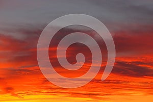 Fiery sunset with clouds in horizontal orientation