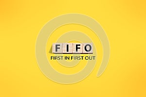 FIFO first in out, text words typography written on wooden letter, life and business motivational inspirational