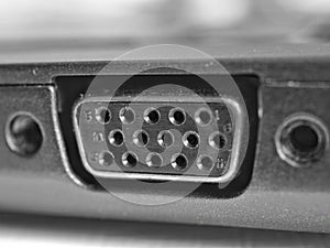 Fifteen way d socket on a laptop side in black and white