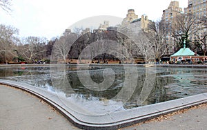 Fifth Avenue skyline, view from Central Park over Conservatory Water, New York, NY, USA