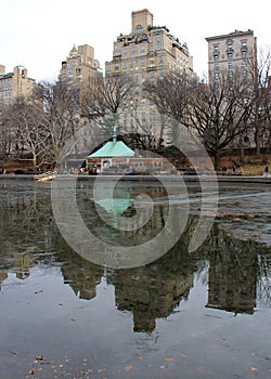 Fifth Avenue skyline, view from Central Park over Conservatory Water, New York, NY, USA