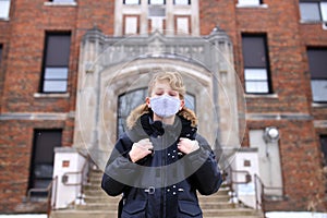 Fifth Grade Boy Child in Covid Face Mask Outside Middle School Education Building