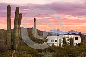 Fifth wheel camping trailer on desert campground