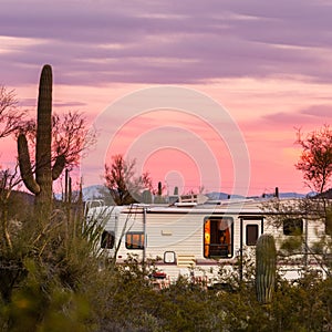 Fifth wheel camping trailer on desert campground