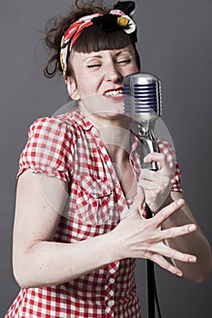 Fifties singer in studio for young woman with retro style