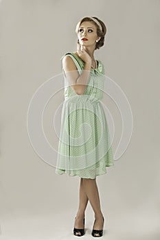 Fifties woman in green dress