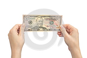 Fifty dollar bill in hands. Isolated on a white background. Woman holding american US money banknote close-up