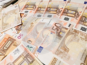 Euro paper money spread on the desk photo