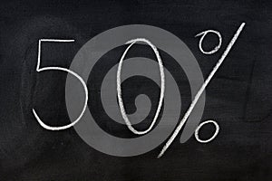 Fifty  percent written on a blackboard photo
