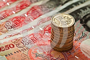 Fifty pounds sterling an coin stack - UK Currency