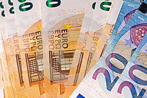 Fifty and twenty euro banknotes close-up. Cash background