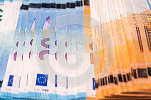 Fifty and twenty euro banknotes close-up. Cash background