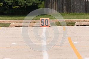 Fifty yard line marker ready for rehearsal at marching band rehearsal