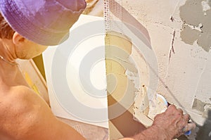 Fifty years old manual worker with wall plastering tools renovating house