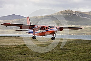 `FIGAS` aircraft landing at Saunders Island in The Falkland Islands