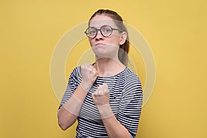 Fight and dangerous concept. Confident woman standing in boxer pose