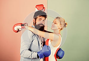 Fight for love. Strength and power. bearded man hipster fighting with woman. family couple boxing gloves. knockout