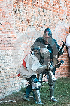 Fight, the struggle of medieval knights in armor. The historical restoration of military events