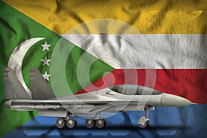 Fighter, interceptor on the Comoros state flag background. 3d Illustration