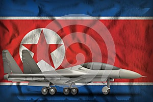 Fighter, interceptor on the Democratic Peoples Republic of Korea North Korea state flag background. 3d Illustration