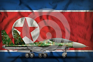 Fighter, interceptor with forest camouflage on the Democratic Peoples Republic of Korea North Korea state flag background. 3d Il