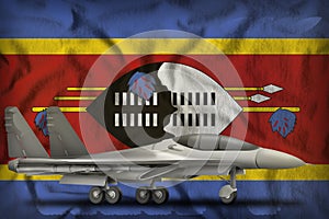 Fighter, interceptor on the Swaziland state flag background. 3d Illustration