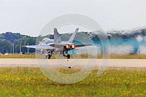 Fighter jet with afterburner photo