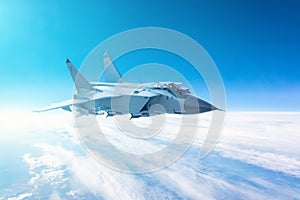 Fighter jet flying with a blue sky background.