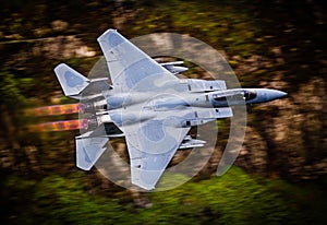Fighter jet in full reheat afterburners photo