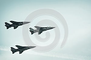 Fighter jets on blue sky background