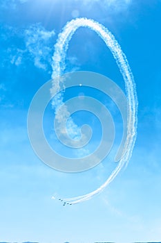 Fighter plane looping in turbo fly on the sky