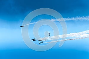 Fighter plane looping in turbo fly on the sky