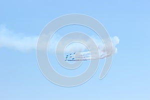 Fighter plane looping in turbo fly on the sky