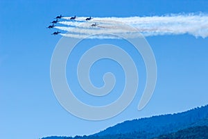 Fighter plane looping in turbo fly on the sky