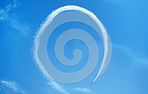 Fighter planes performing a perfect loop in formation