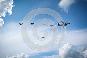 Fighter planes refueling in flight