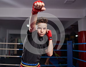 Fighter shadow boxing in the ring