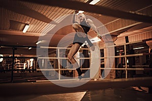 Fighter shadowboxing on training ring