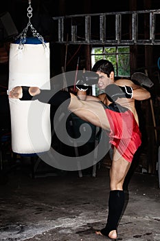 Fighter training in garage.