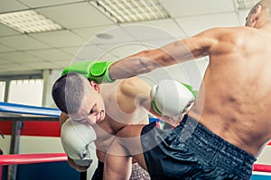 Fighters fighting on the ring