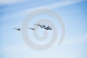 Fighters, flying helicopters at The Victory Day military parade.