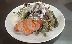 Fighting Obesity / Breadcrumbed Hake, French Beans And Salad photo