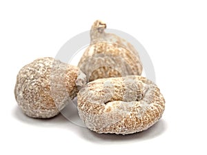 Figs in a close-up against a white background