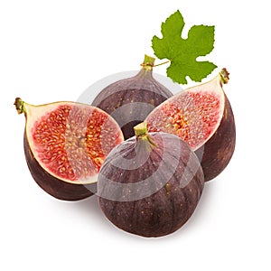 Figs isolated. Two whole ripe figs fruit and cut half slices isolated on white background with green leaves