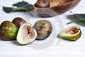 Figs and leaves on a white background