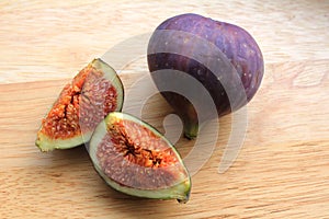 Figs on the wooden desk
