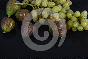 Figs and yellow grapes