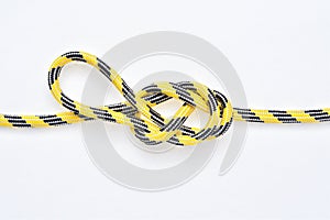 Figure 8 Directional Loop knot on yellow and black nylon rope