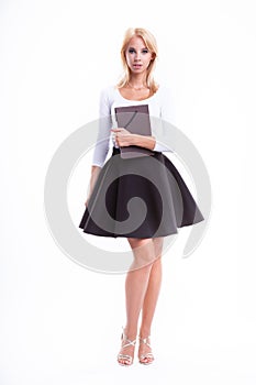 figure of a beauty young blonde student woman wearning a notebook